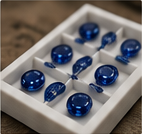 Selected blue sapphires arranged in a parcel